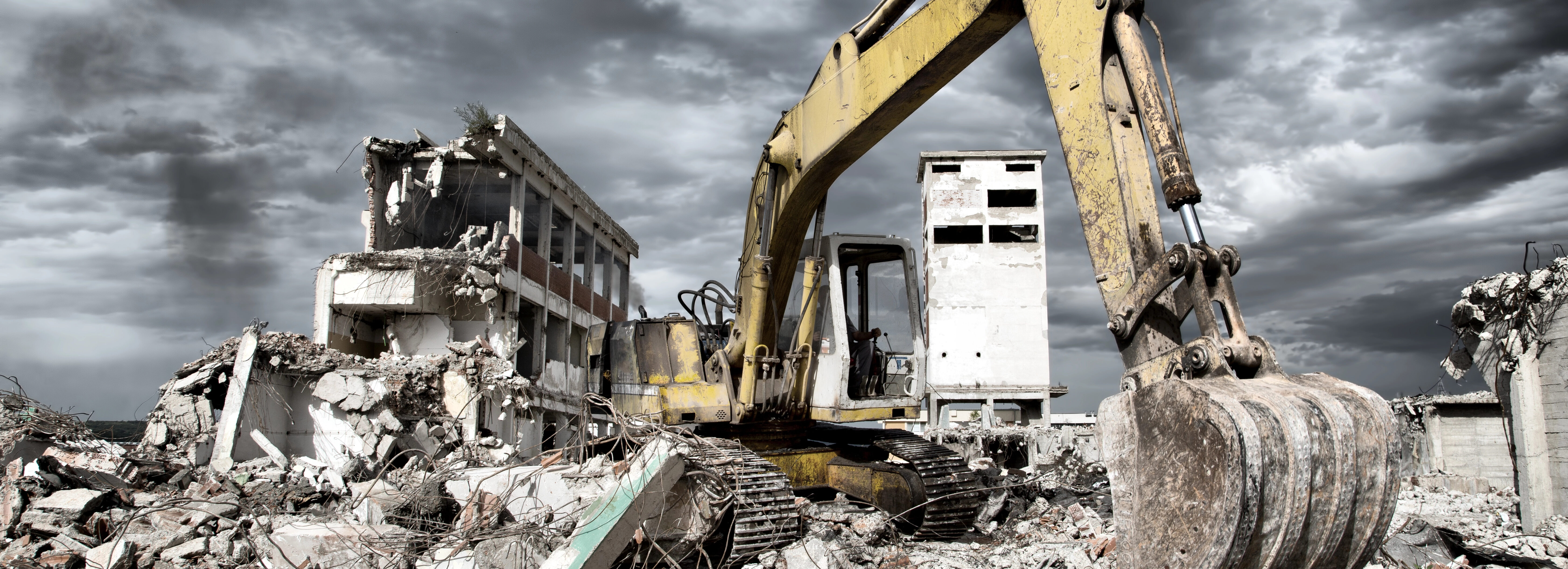 Bulldozer removes the debris from