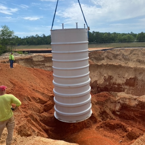 chavers construction lift station partially installed in the ground